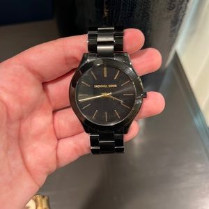 Black and gold mk watch